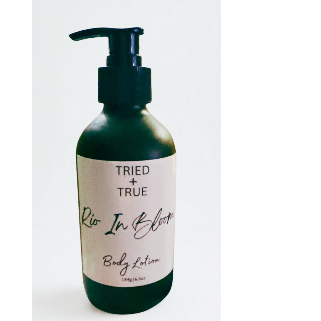 Tried + True body lotion in a black pump bottle labeled ‘Rio In Bloom.